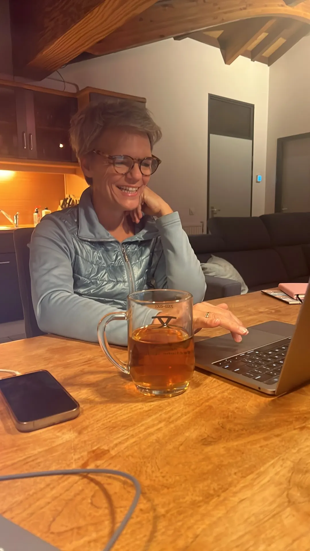 Ivanka Menken on a mentoring call from a kitchen table while away from home